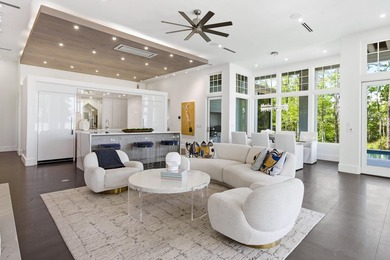 Located in the prestigious gated waterfront community of - photo 12
