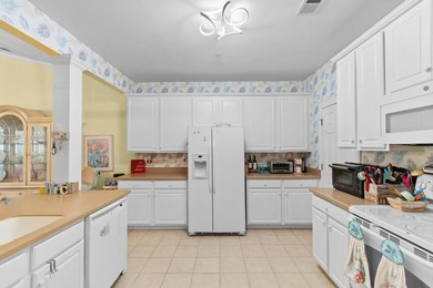Welcome home to easy, FULLY FURNISHED, carefree living in the - photo 3
