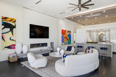 Located in the prestigious gated waterfront community of - photo 14