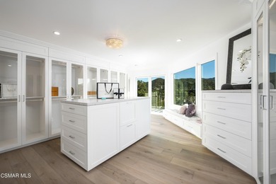 A modern residence defined by glass, light, and landscape. - photo 16