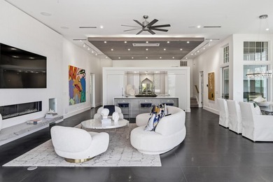 Located in the prestigious gated waterfront community of - photo 18