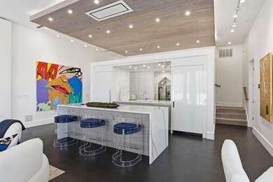 Located in the prestigious gated waterfront community of - photo 20