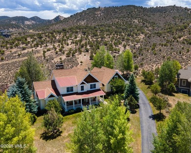 Positioned on arguably the finest lot in Eagle Ranch, this - photo 2