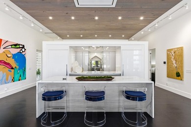Located in the prestigious gated waterfront community of - photo 23
