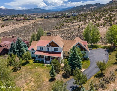 Positioned on arguably the finest lot in Eagle Ranch, this - photo 3