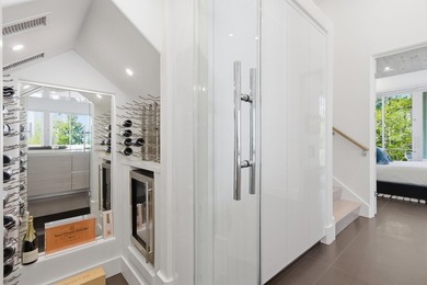 Located in the prestigious gated waterfront community of - photo 24