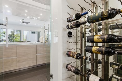 Located in the prestigious gated waterfront community of - photo 25