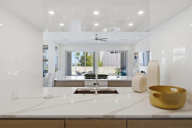 Located in the prestigious gated waterfront community of - photo 26