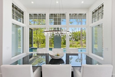 Located in the prestigious gated waterfront community of - photo 31