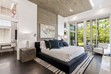 Located in the prestigious gated waterfront community of - photo 32