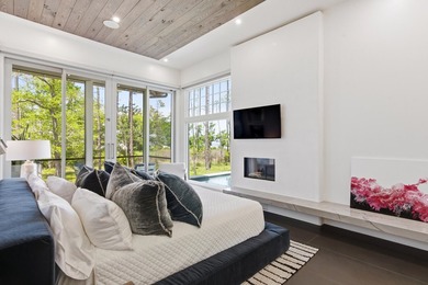 Located in the prestigious gated waterfront community of - photo 34