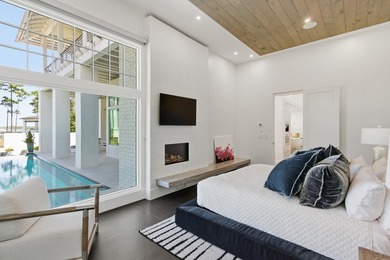 Located in the prestigious gated waterfront community of - photo 35