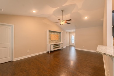 Welcome home to Island Club at Sun Colony, a sought-after - photo 8