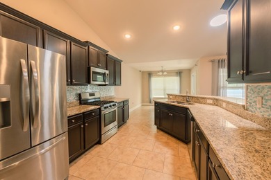 Welcome home to Island Club at Sun Colony, a sought-after - photo 9