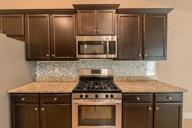 Welcome home to Island Club at Sun Colony, a sought-after - photo 10