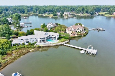 Indulge in luxury living with this breathtaking waterfront - photo 1