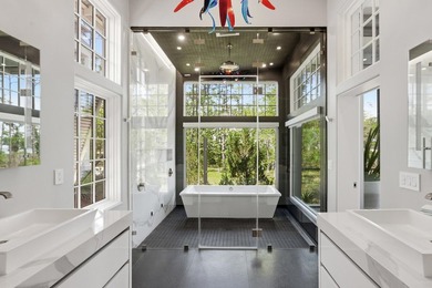 Located in the prestigious gated waterfront community of - photo 42