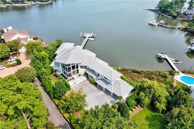 Indulge in luxury living with this breathtaking waterfront - photo 2