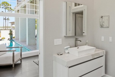 Located in the prestigious gated waterfront community of - photo 43