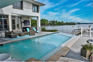 Indulge in luxury living with this breathtaking waterfront - photo 3