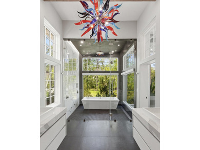 Located in the prestigious gated waterfront community of - photo 44