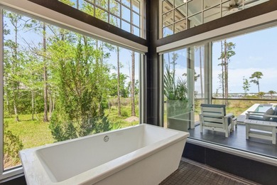 Located in the prestigious gated waterfront community of - photo 45