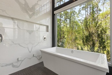 Located in the prestigious gated waterfront community of - photo 46