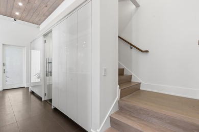 Located in the prestigious gated waterfront community of - photo 47