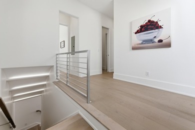 Located in the prestigious gated waterfront community of - photo 48