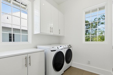 Located in the prestigious gated waterfront community of - photo 49