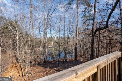 Sitting on a deep-water cove with water views, this fully - photo 6
