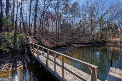 Sitting on a deep-water cove with water views, this fully - photo 9