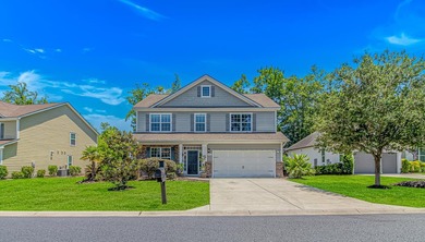Welcome to the gated community of Rivers Edge Plantation, where - photo 2