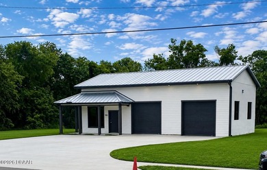 TOTALLY RENOVATED AND UPGRADED -NO EXPENSE HAS BEEN SPARED - photo 1