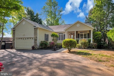 Discover this stunning raised ranch home nestled in the - photo 3