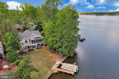 Discover this stunning raised ranch home nestled in the - photo 4