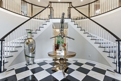 This stately home in Coosaw Creek Country Club is located on a - photo 5