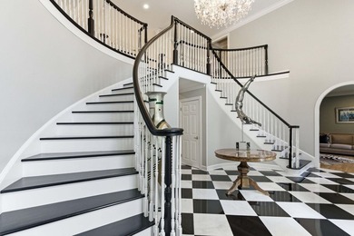 This stately home in Coosaw Creek Country Club is located on a - photo 6