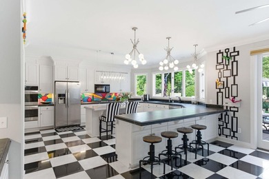This stately home in Coosaw Creek Country Club is located on a - photo 7