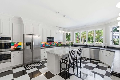This stately home in Coosaw Creek Country Club is located on a - photo 9