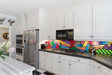 This stately home in Coosaw Creek Country Club is located on a - photo 10