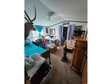 Peaceful country living awaits on this 3.4 acre wooded property