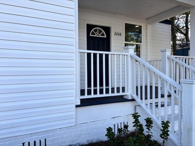 Welcome Home! This adorable home has been fully renovated and is - photo 2