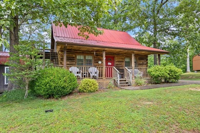 Charming Furnished Cabin Near Lake Cumberland! Escape to this - photo 3