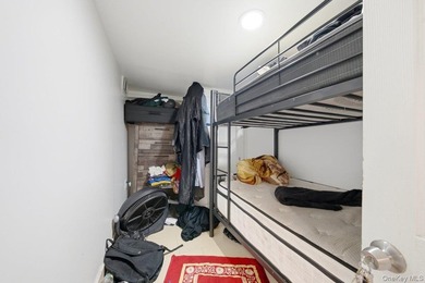 Brick 3-family home in the Grand Concourse featuring three - photo 12