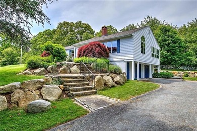Perched atop a hillside along a winding drive, this one level - photo 3