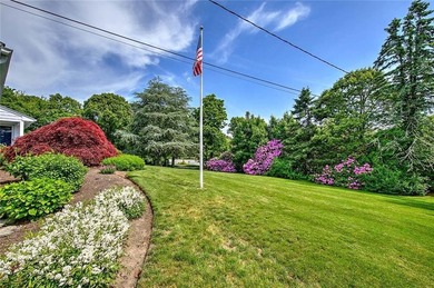Perched atop a hillside along a winding drive, this one level - photo 6