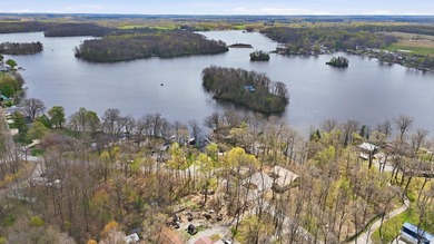 Welcome to 1080 North Shore Drive in Rome City on Sylvan Lake, a - photo 2
