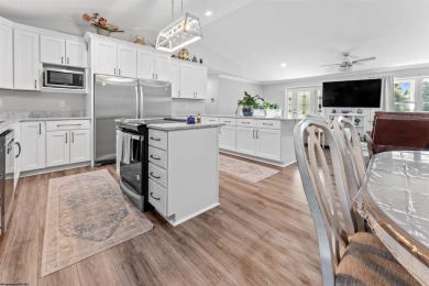 Tucked away on a private road, this gorgeous home offers the