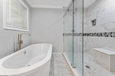 Tucked away on a private road, this gorgeous home offers the